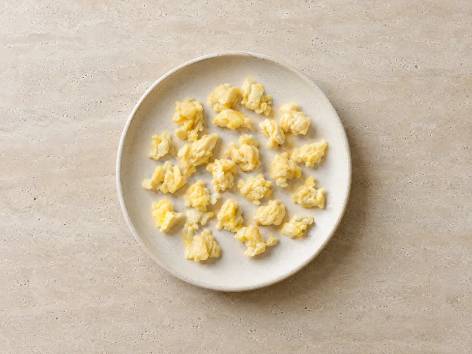 Egg for 9 months+: small pieces of scrambled egg