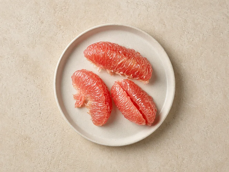 Grapefruit for 6 months+: large membrane-free pieces that squash easily, seeds removed